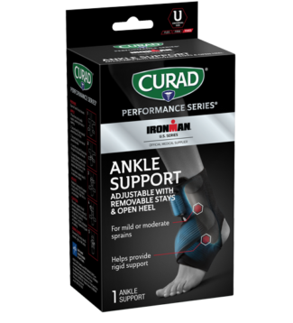 Packaging for CURAD Performance Series IRONMAN Ankle Support, adjustable with removable stays and an open heel. It's designed for mild or moderate ankle sprains and to provide rigid support, depicted with an image of the brace on a foot.